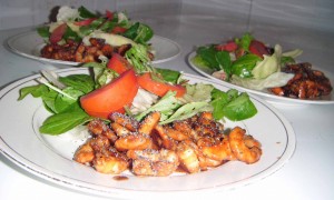 Wasabi Honey Shrimp - plated Wasabi Honey Shrimp with green salad ready for serving