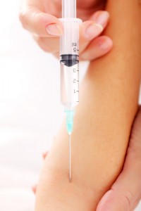 Cancer Treatments speeds death - Needle injection into arm